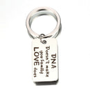 Family Gift "DNA Doesn't Make You Family Love Does"Stainless Steel Key chain- OZ