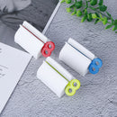 Plastic Rolling Tube Toothpaste Seat Holder Rotate Bathroom Rotate Squeezer   Z